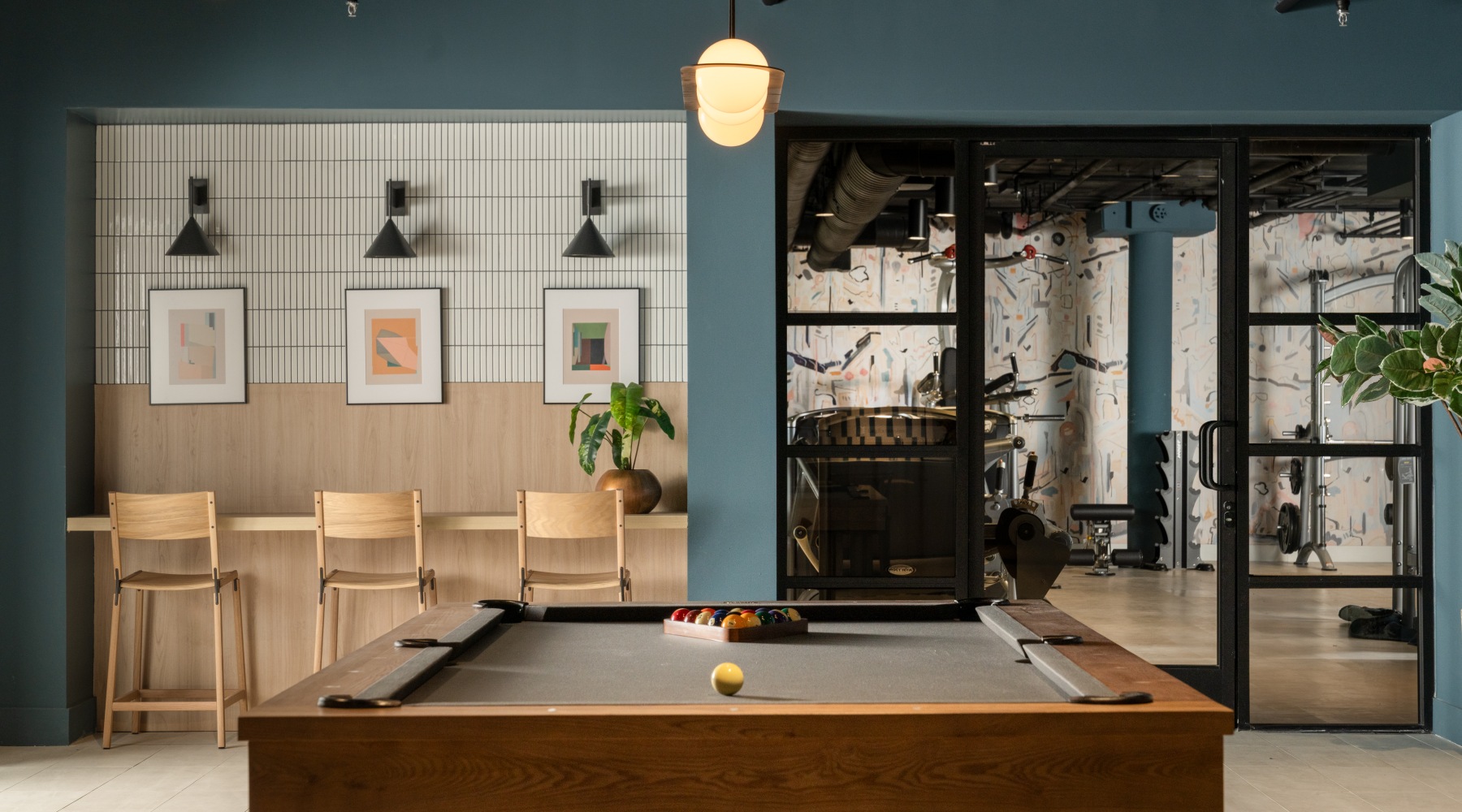 pool table with desks behind